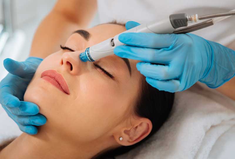 woman getting a hydrafacial