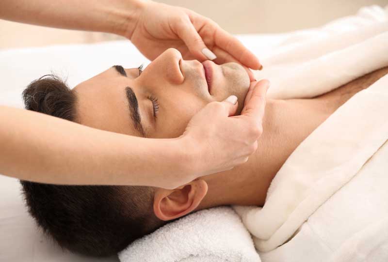 Man getting a facial.