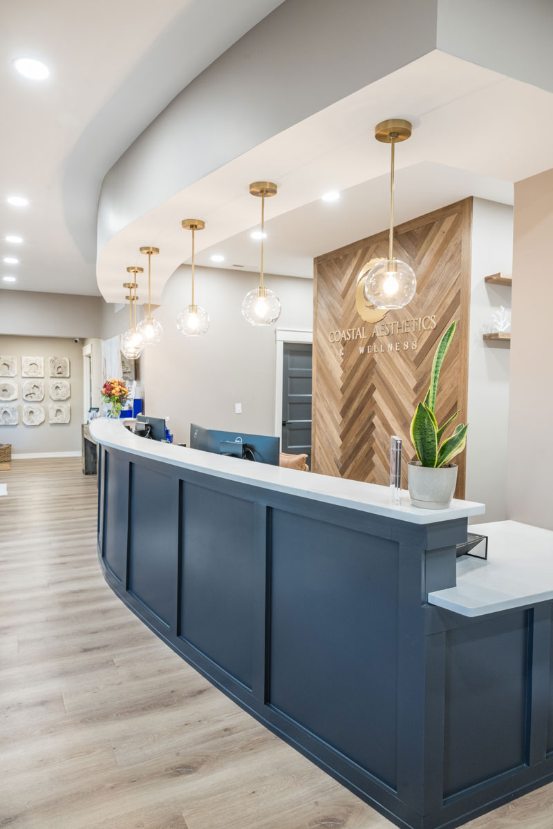 Clean, professional medical spa treatment room with neutral tones at Coastal Aesthetics in Salisbury